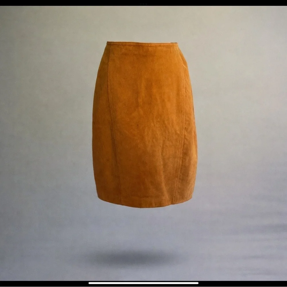 True vintage suede—real leather with clean tailoring an earlier designer era.